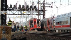 PHOTO: Emergency workers arrive the scene of a Metro North train collision, May 17, 2013 in Fairfield, Conn.