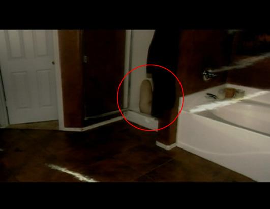 Part of Travis Alexander's body is visible in the shower where he was found.