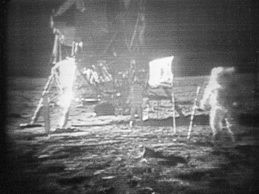 PHOTO: In this July 20, 1969 file photo, Apollo 11 astronaut Neil Armstrong, right, trudges across the surface of the moon leaving behind footprints.