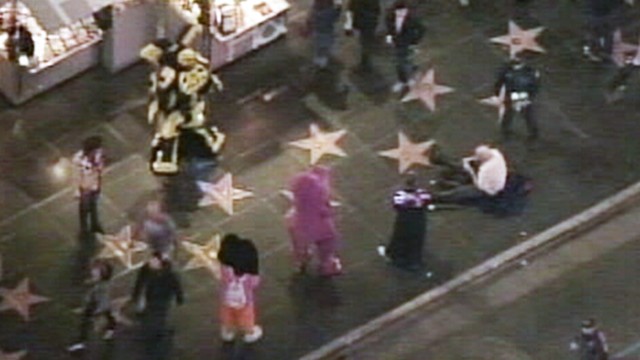 VIDEO: No arrests made, but one costumed character was pepper sprayed by police.