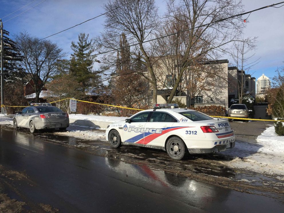 PHOTO: Police cars are parked outside the home of billionaire Barry Sherman, Dec. 17, 2017 in Toronto.