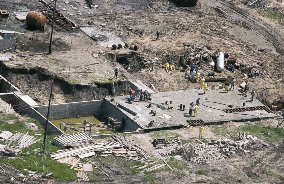 PHOTO: Investigators work on top of the underground bunker at the Branch Davidian compound near Waco, Texas, May 3, 1993, as the search continues for more bodies at the burned out compound.