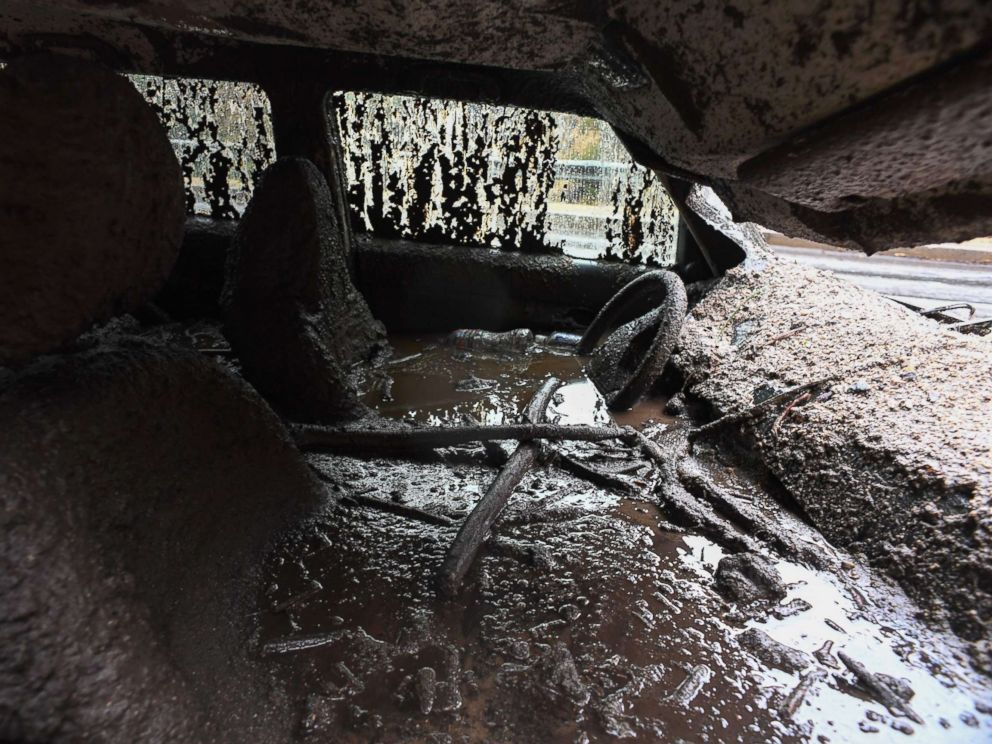 PHOTO: Mud fills the interior of a car destroyed in a rain-driven mudslide in a neighborhood under mandatory evacuation in Burbank, Calif., Jan. 9, 2018. 