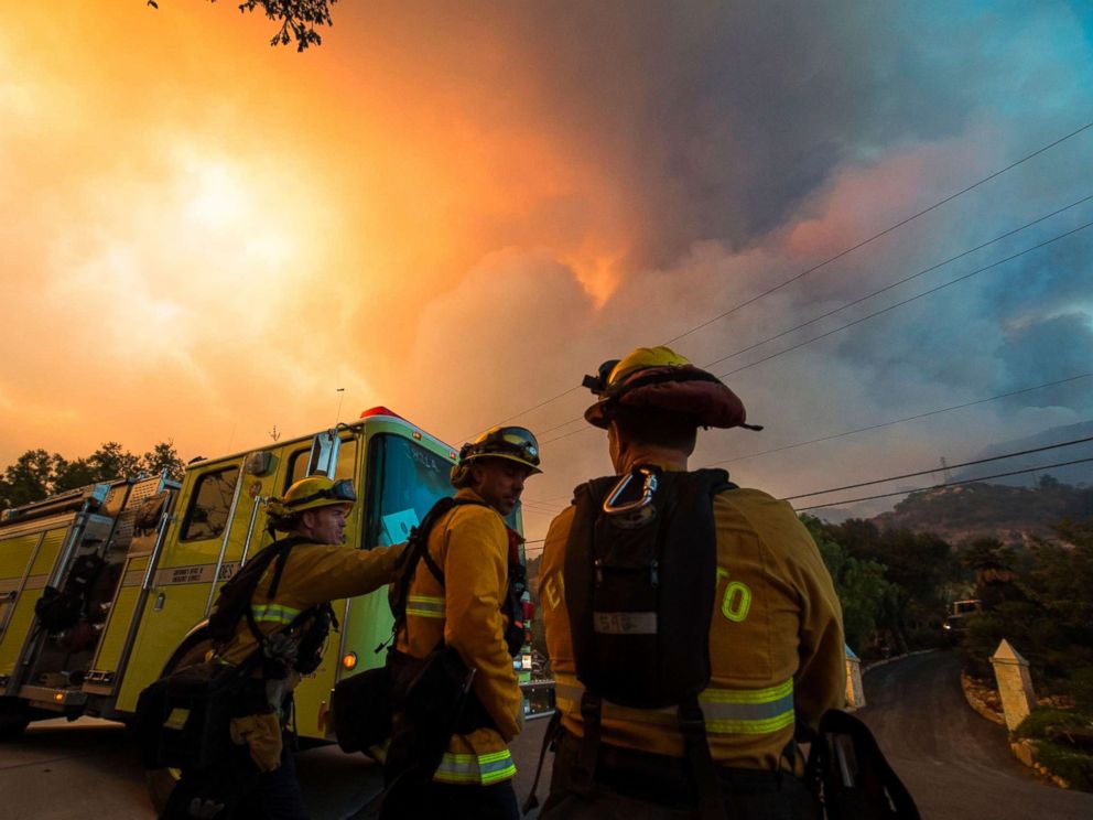 PHOTO: Firefighters from the Governors Office of Emergency Services monitor the advance of smoke and flames from the Thomas Fire, Dec. 16, 2017 in Montecito, Calif.