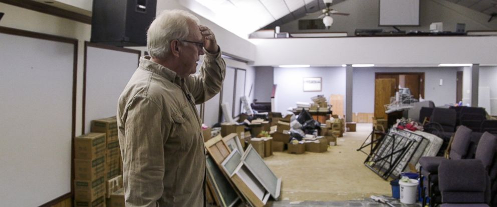 PHOTO: Pastor Charles Stoker surveys the damage from Hurricane Harvey to his church , Hi-Way Tabernacle in Cleveland, Texas. 
