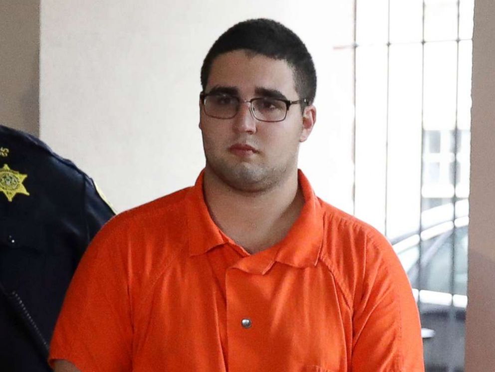 PHOTO: A law enforcement official escorts Cosmo DiNardo to a vehicle, July 13, 2017, in Doylestown, Pa.