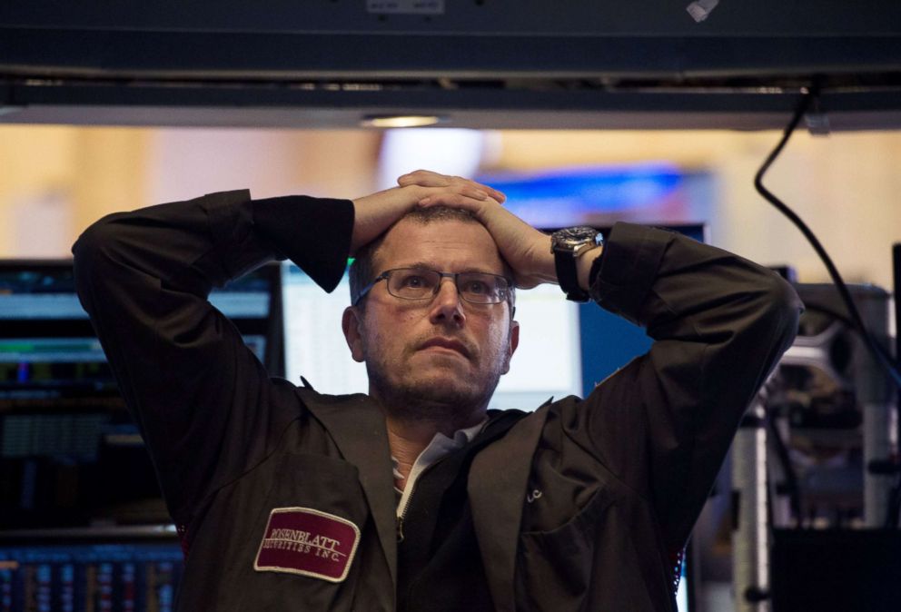 PHOTO: A trader works on the floor at the closing bell of the Dow Industrial Average at the New York Stock Exchange, Feb. 5, 2018 in New York. 