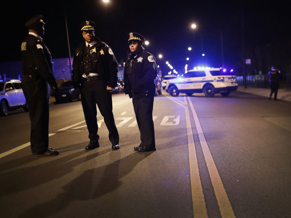 PHOTO: Police monitor a vigil being held in the Park Manor neighborhood to honor 11-year-old Takiya Holmes who died after being shot in the head by a stray bullet, Feb. 14, 2017 in Chicago.