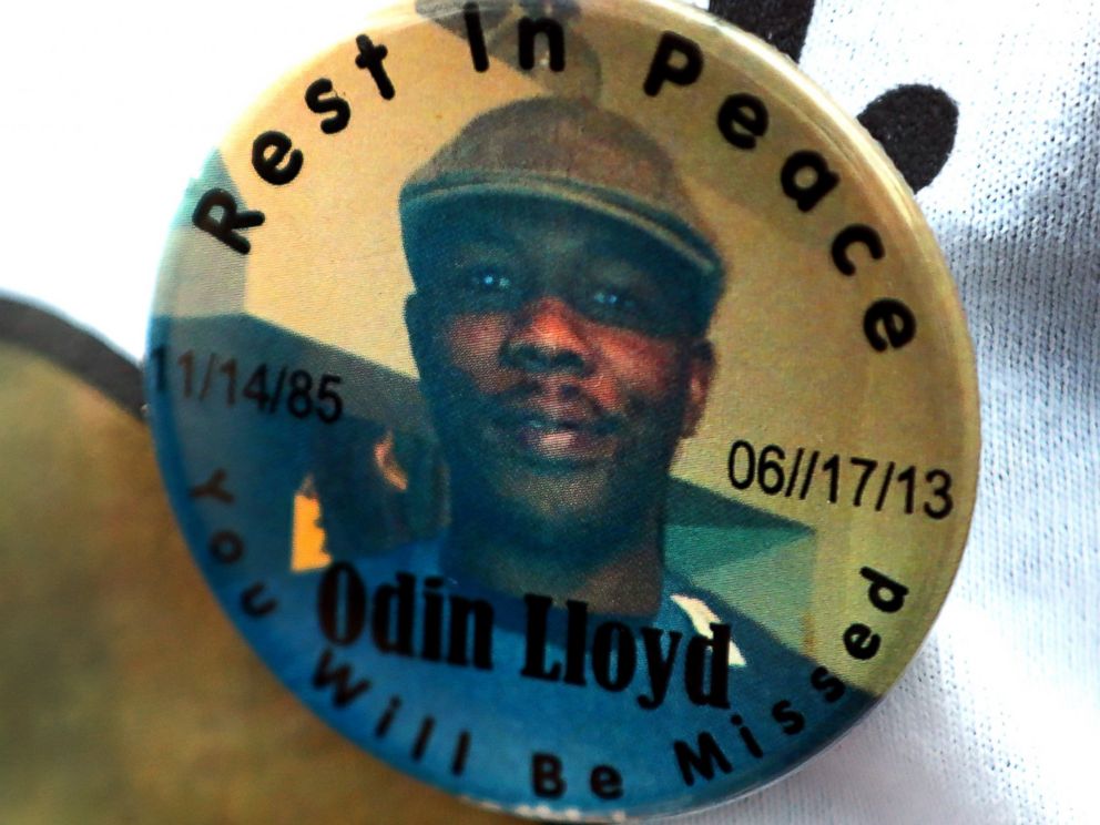 PHOTO: A funeral service was held for Odin Lloyd at the Holy Spirit Church in Mattapan. Lloyd was allegedly shot to death by former Patriots player Aaron Hernandez. A funeral-goer wears a button with his portrait.