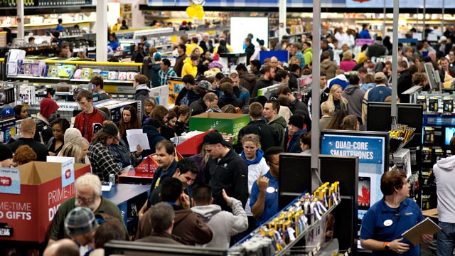 PHOTO: Shoppers browse inside a Best Buy Co. store in Peoria, Ill., Nov. 23, 2012.