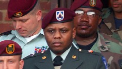 PHOTO: Sgt. Hasan Akbar is led from the Staff Judge Advocate Building after the first day of sentencing procedures April 25, 2005 in Fort Bragg, North Carolina.