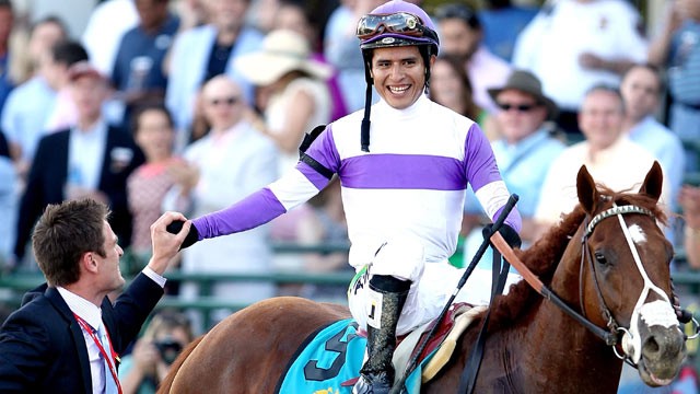 PHOTO: Mario Gutierrez is congratulated by Jack Sisterson after riding I'll Have Another to win the 137th Preakness Stakes at Pimlico Race Course, May 19, 2012 in Baltimore, MD.