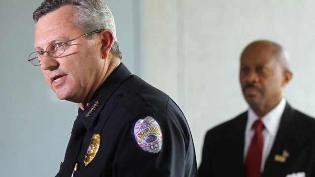 PHOTO: Bill Lee, left, on March 22, 2012, announced he was temporarily stepping down as police chief in the wake of the Trayvon Martin killing as Sanford city manager Norton Bonaparte Jr., right, stood by.
