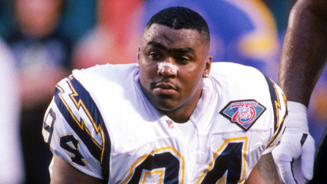 PHOTO: Defensive end Chris Mims #94 of the San Diego Chargers watches the action from the sidelines during Super Bowl XXIX against the San Francisco 49ers at Joe Robbie Stadium on January 29, 1995 in Miami, Florida.