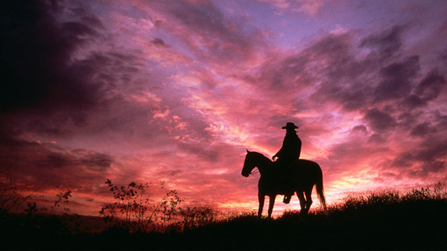 PHOTO: Cowboy riding off into the sunset