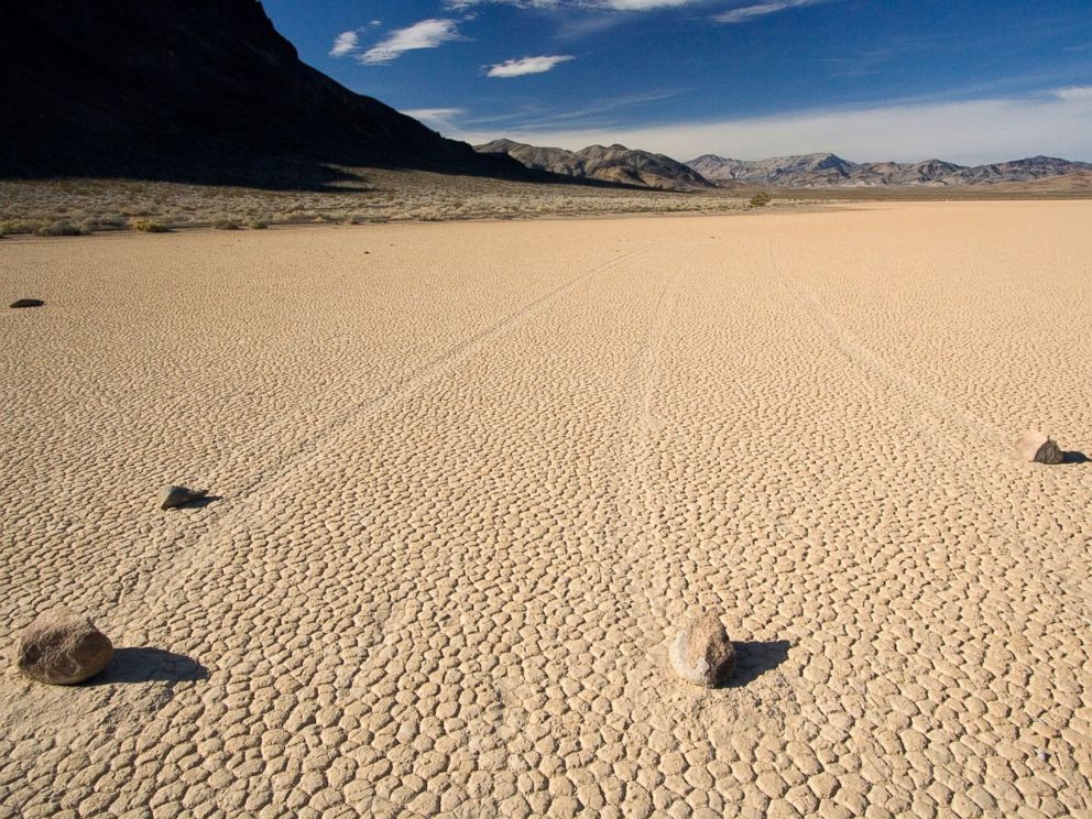 PHOTO: A recent study by PLOS suggests that the movement of these stones is caused by the melting ice sheet in Racetrack Playa, Calif.