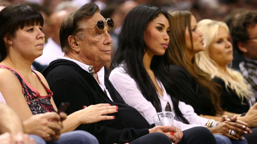 PHOTO: Team owner Donald Sterling of the Los Angeles Clippers and V. Stiviano watch the San Antonio Spurs play on May 19, 2013 in San Antonio, Texas.