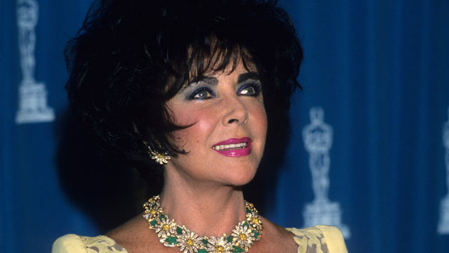 PHOTO: Elizabeth Taylor poses with her Oscar at the 65th Annual Academy Awards at the Shrine Auditorium on March 29, 1993 in Los Angeles, California.