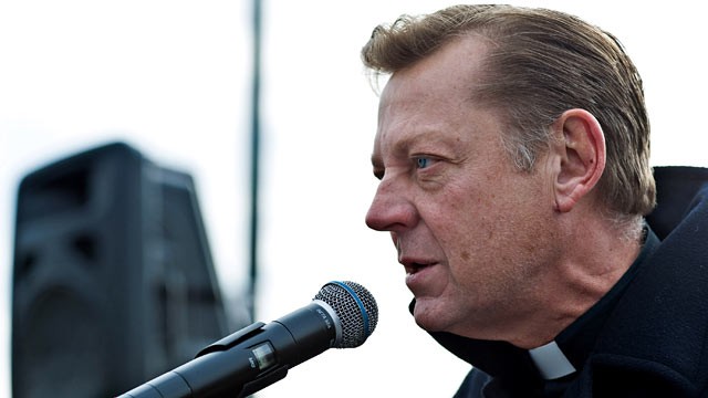 PHOTO: Father Michael Pfleger attends a ceremony honoring the late comedian Bernie Mac with a street sign, Feb. 28, 2012 in Chicago, Illinois.