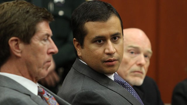 PHOTO: George Zimmerman, center, sits during his bond hearing with his attorney Mark O'Mara, left, in a Seminole County courtroom on June 29, 2012 in Sanford, Fl.