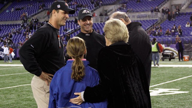 PHOTO: Head coach Jim Harbaugh, left, of the San Francisco 49ers and his brother, head coach John Harbaugh of the Baltimore Ravens, center, talk with their parents Jack and Jackie Harbaugh, and Johns daughter Allison, before the start of the game between