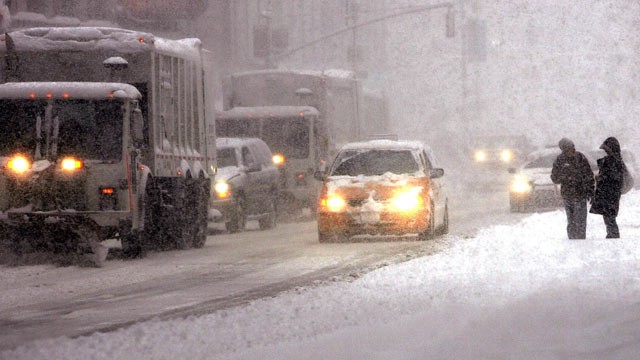 PHOTO: Plows and taxis mingle on the street during a snowstorm in this Feb. 12, 2006 file photo in New York City.