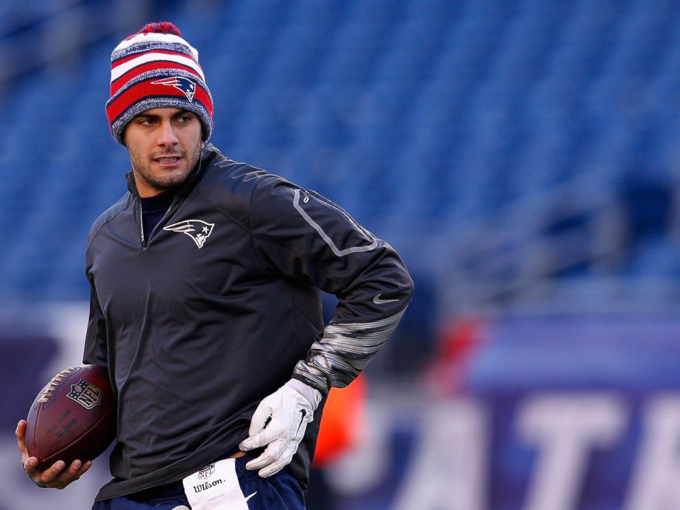 PHOTO: Jimmy Garoppolo of the New England Patriots warms up before the 2014 AFC Divisional Playoffs game against the Baltimore Ravens on Jan. 10, 2015 in Foxboro, Mass.
