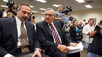 PHOTO: Joe Arpaio, right, confers with his lead investigator Michael Zullo during a news conference announcing the findings of his investigation into the authenticity of President Barack Obama's birth certificate.