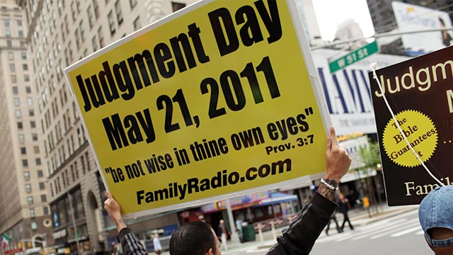 PHOTO: Man holding 'Judgment Day' sign