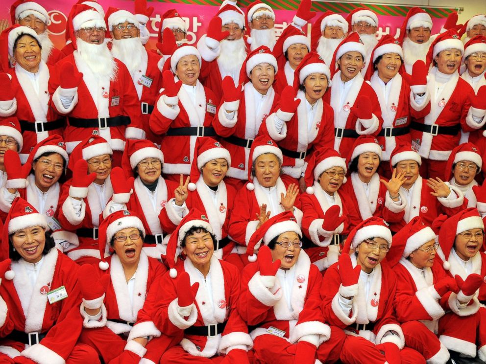 PHOTO: South Korean senior volunteers, clad in Santa Clause costumes, pose for a picture during a chairty event on December 15, 2009.