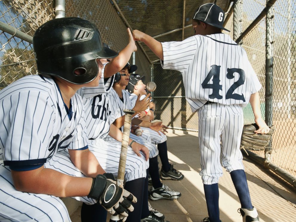 PHOTO: A Little League team sits in a dugout in this undated stock photo.