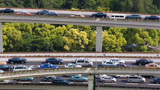 PHOTO: Cars traveling bumper to bumper on highway.