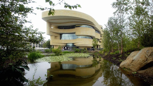 PHOTO: The Smithsonian National Museum of the American Indian is cantilevered, curving bands of rough-cut limestone project 50 feet from the body of the building, protecting the east entrance from a crash attack.