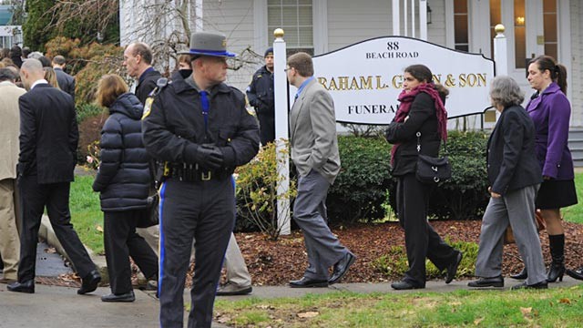 PHOTO: Mourners leave Noah Pozner funeral service