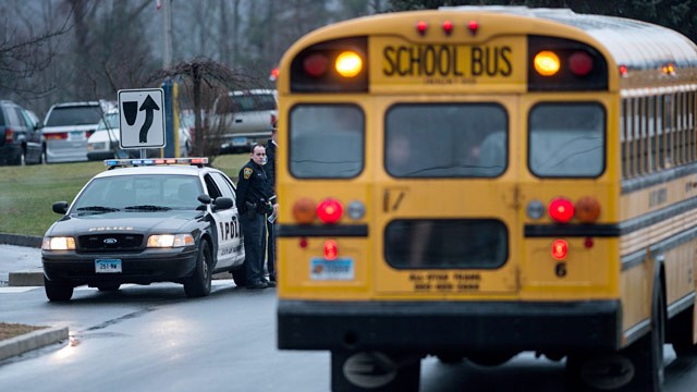 PHOTO: Police watch school bus