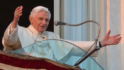 PHOTO: Pope Benedict XVI waves to faithful from a balcony upon arrival in Castel Gandolfo on February 28, 2013.
