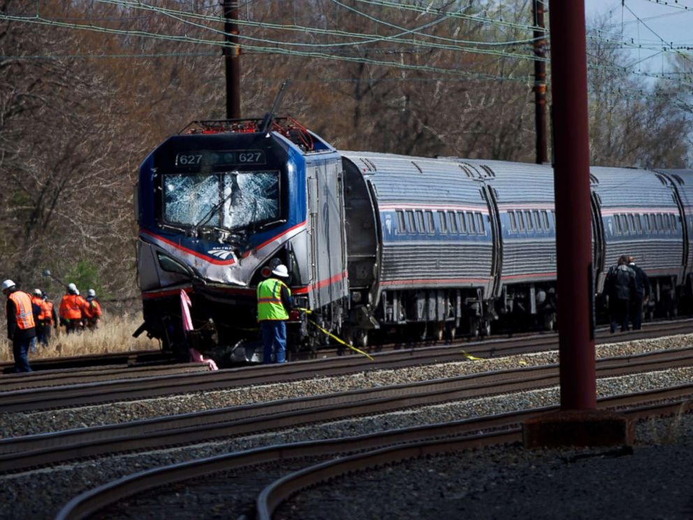 PHOTO: Emergency personnel investigate the crash site of Amtrak Palmetto train 89 in this April 3, 2016 file photo in Chester, Pa.