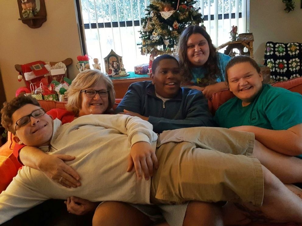PHOTO: Davion Only-Going, 19, center, who captured the worlds heart in 2013 when he publicly pleaded for a family, is celebrating his second adoption anniversary with the Goings of Florida.