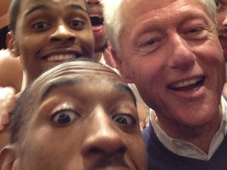 Clinton Celebrates Win with Team