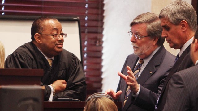PHOTO: Judge Belvin Perry listens to defense attorney Cheney Mason, right, during a sidebar before the start of court in the Casey Anthony trial at the Orange County Courthouse in Orlando, Fla., June 20, 2011.