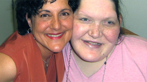 PHOTO Tanya Angus (right), now 31, with her soon-to-be godmother Tina Ville, who has designed a web site on acromegaly in the hopes of helping others diagnose and treat their gigantism.