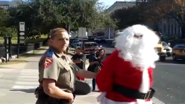 PHOTO: Police arrest man dressed as Santa