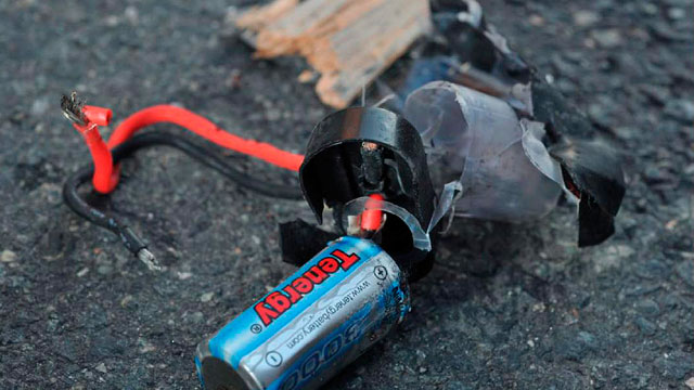 PHOTO: Boston Marathon bomb scene pictures taken by investigators show the remains of an explosive device, April 16, 2013.