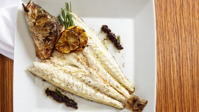 PHOTO: Abboccato?s branzino with salsa verde and marinated artichokes is shown here.