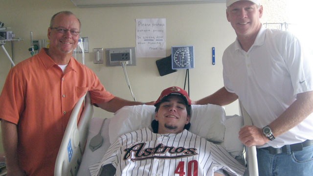PHOTO:&nbsp;Buddy Lamothe poses for a photo with Astros scout Rusty Pendergrass, left, and college coach Tom Arrington.