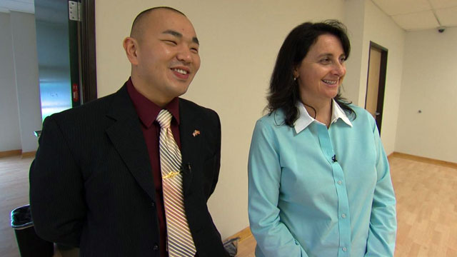 PHOTO: Michael Chan, a marine veteran who served in Iraq, stands with Victoria Alonso, head of visual effects at Marvel Studios.