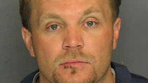 PHOTO: A photo of Christopher Michael Carrolls mugshot.