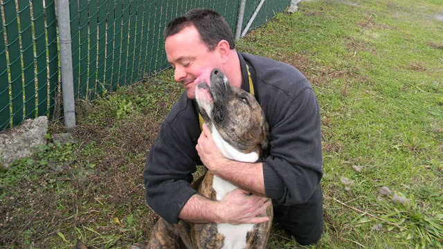 PHOTO: Douglass Keanes dog, Cash, was nearly euthanized for being too aggressive before Colleen Combs rehabilitated him.