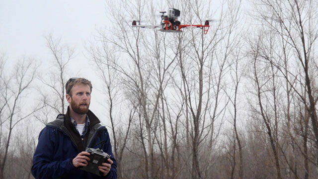 PHOTO: Journalism students at the University of Missouri School of Journalism practice flying "J-Bots", or journalism drones, which are being used to gather coverage in news reporting.