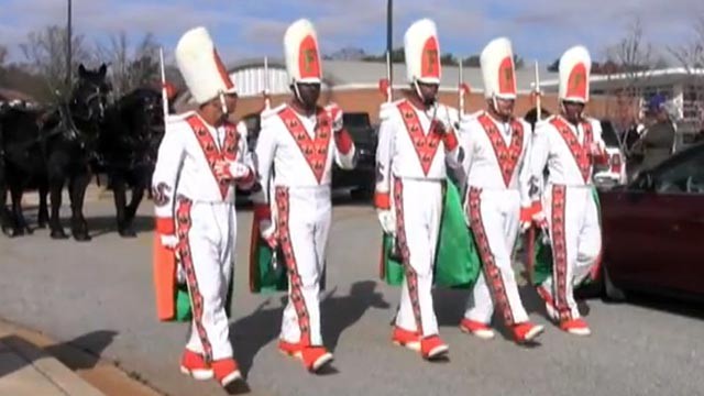 PHOTO: In this image from a video on the Rattler Nation blog, members of the Florida A&M University marching band lead a horse-drawn carriage carrying the casket of Robert Champion on Nov. 30, 2011 in Decatur, Ga.
